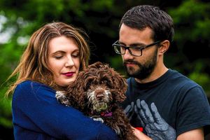 Catherine and Matt Baker, from Market Drayton, with puppy Pepper who has recovered after her nasty 'meal' in the park