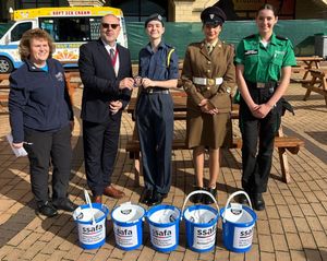 Katrina McNamara from SSAFA - the armed forces charity, with the Mayor of Wolverhampton, Cllr Craig Collingswood and Mayoral cadets.