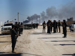 Supporting image for story: US military transfers 150 Islamic State group detainees from Syria to Iraq