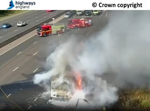 Emergency services on the scene of the fire on the M6 southbound near Coventry. Photo: National Highways