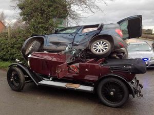 Supporting image for story: PICTURED: Classic car enthusiast has lucky escape after vehicle ends up on top of vintage motor