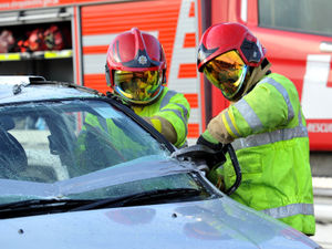 Supporting image for story: Ambulance and firefighters called after car crashes and lands on roof in village