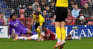 Charlie McCann makes it 2-0 to Barrow.