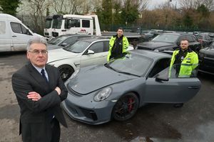 PCC Simon Foster and police officers from the Commercial Vehicle Unit Mitch Harvey (taller) and Jim Barry.