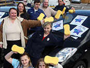 Supporting image for story: Car wash trio drive to replace cancer cash