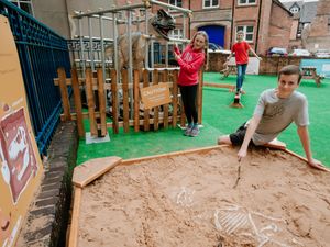 Supporting image for story: Shrewsbury car park transformed into Jurassic world