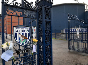 Tributes have been left at the front gates to Mark Townsend