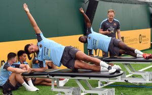 Morgan Gibbs-White of Wolverhampton Wanderers and Bright Enobakhare of Wolverhampton Wanderers during the first day back at Training
