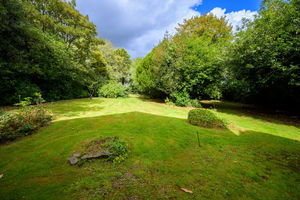 The property boasts expansive gardens, sitting in a 1.25 acre plot. Picture: Barbers/Rightmove