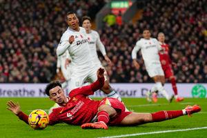 Action from Villa's defeat at Anfield
