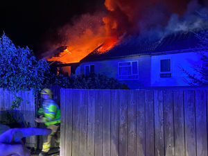 Dozens of crews including an aerial platform at the scene of the fire. Photo: Craig Jackson of SFRS