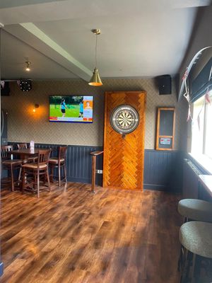 A new dart board has been installed, along with a pool table