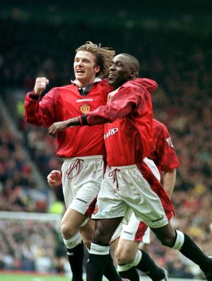 David Beckham and Andy Cole celebrate against Walsall