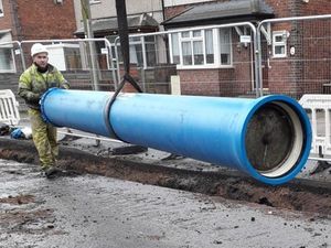 Supporting image for story: Work on track to replace burst water main in Tipton