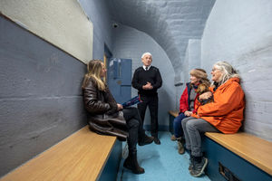Officer Goodwin leading a tour of the prison.