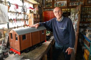 Derek in the workshop where he builds his trains