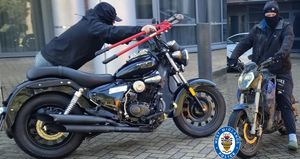 The dramatic images issued by West Midlands Police show a man with bolt cutters taking the bike. Photo: West Midlands Police