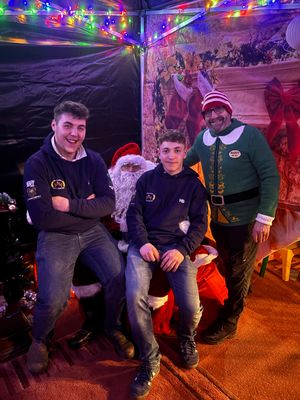 Young farmers Josh Barratt and Tom Wellings - telling Santa how good they have been