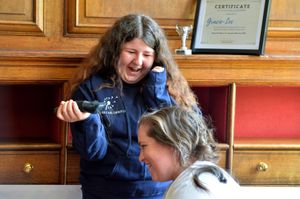 Gracie-Lee was excited as the shaving commenced 