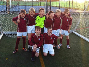 Supporting image for story: Moat Hall toasting a double success