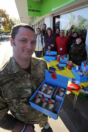 Sapper Clive Smith, from Hednesford, promoting this year's Poppy Appeal with members of the Pelsall Royal British Legion, in High St, Pelsall.