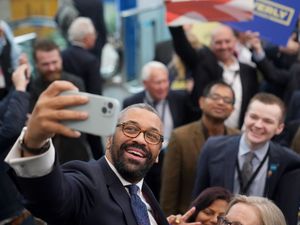 Supporting image for story: James Cleverly says he has boxes full of Warhammer 40k figurines