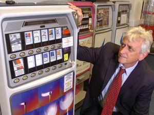 Supporting image for story: Cigarette vending machine facing closure