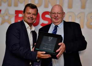John Edge receives his award