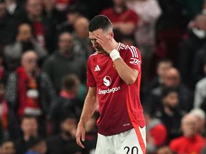 Manchester United’s Diogo Dalot reacts