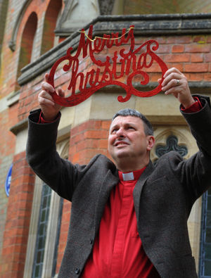 Getting ready for a Christmas event in June, reverend Chris Dowd 