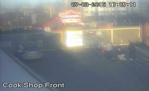 Passers by, some with children, rush to Mr Cruwys's aid seconds after the brutal attack