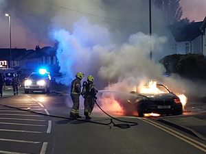 Supporting image for story: Dramatic pictures show car on fire in Halesowen as firefighters reveal cause