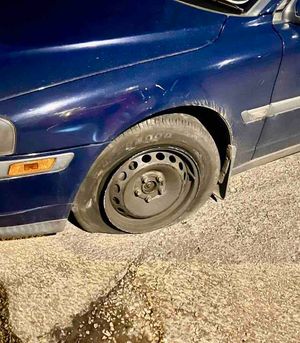 The driver was left having to run after hitting a kerb and flattening the tyre. Photo: WMP Traffic