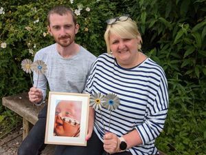 Supporting image for story: Parents support Hope House hospices with daisies in their beloved son's memory