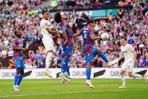 Aston Villa's Ezri Konsa (second left) misses an opportunity on goal during the Emirates FA Cup semi-final match at Wembley Stadium, London. Picture date: Saturday April 26, 2025.