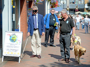 Supporting image for story: Watch: MP Owen Paterson walks though town blindfolded to highlight guide dogs charity