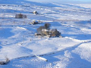 Supporting image for story: Snow and heavy winds bring travel disruption with airport runways shut