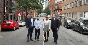 SPR with sign outside new office on Newhall St, Birmingham. L to R - Jamie Naish, Alex Devlin, Jess Patel, Paul Cadman