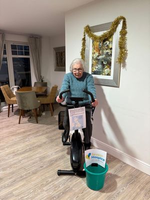 Joleen Hayes, 91, taking part in the cycling challenge. Picture: Hayley Heeks, Duty Manager, Stiperstones Court.