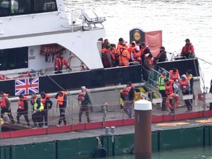 Supporting image for story: Migrants brought to shore after crossing English Channel