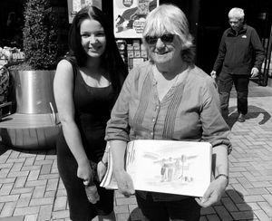 Evie with local artist Chris Hammond