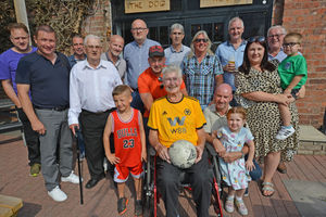 Bill Bowering, the founder of Nova United FC, with family and friends