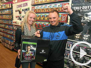 Supporting image for story: Thousands of gamers queue to get hands on Xbox One