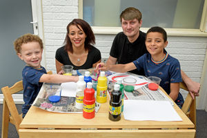 Dane Miller and Jay Walker, with children Luca, 10, and Leo, five, who have been home schooling during lockdown