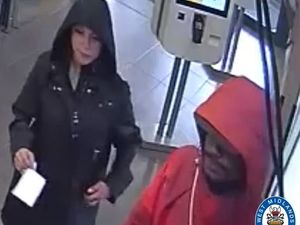 Supporting image for story: CCTV image of two people in McDonalds released by police during investigation into Dudley van robbery