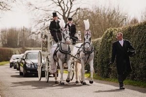 Winnie-Grace's coffin was pulled by horses to the service