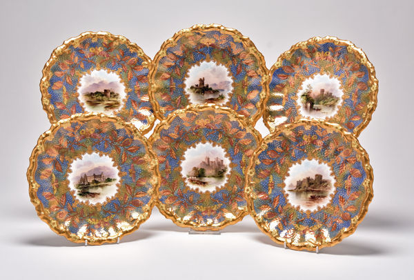 A set of named view Coalport dessert plates that sold for £420.