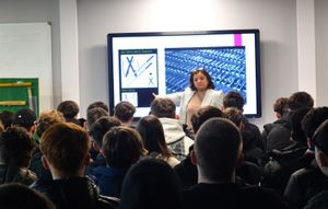 Pooja Kanda presenting to students