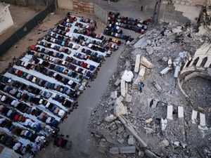 Supporting image for story: Eid under way in Gaza Strip with prayers outside destroyed mosques