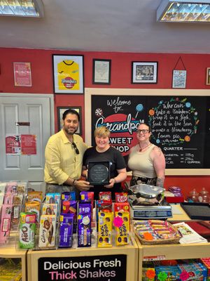 Shaz Saleem and Lydia Longville present to Anna Hubble